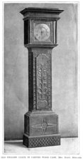 Old English Clock in Carved Wood Case.  Mrs. Eliot.  England.