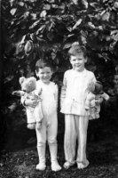 Peter Wallace Macky and David Wallace Macky in jammies with teddies, Dec 1940