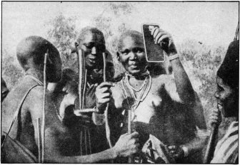 "After You!" — Masai Belles Surveying Their Own Charms