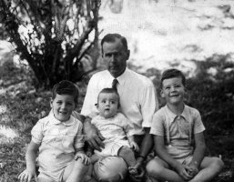 Wallace Armstrong Macky with Peter Wallace Macky (4½ yr), Ian Wallace Macky (8 mo) and David Wallace Macky (nearly 6 yr), Rocklands, Warwick, Sep 1941