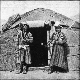 Smiling Kirghiz at the Door of Their Temporary Abode